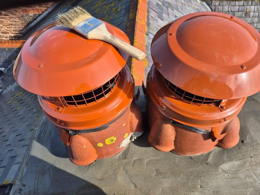 Weatherproof cowls fitted to chimney pots