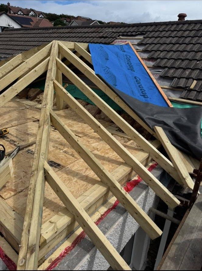 New timber roof extension frame with sarking felt, Isle of Man