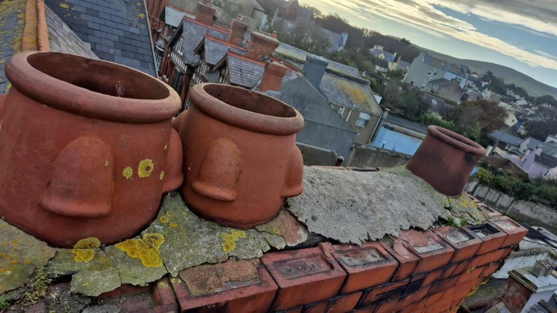 Chimney stack with a view out over the Isle of Man