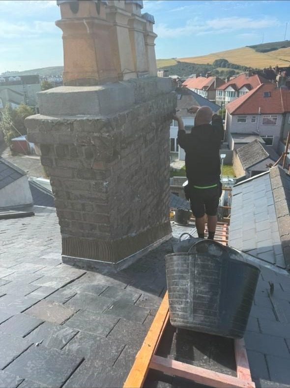 Repointing an ornate ashlar chimney stack