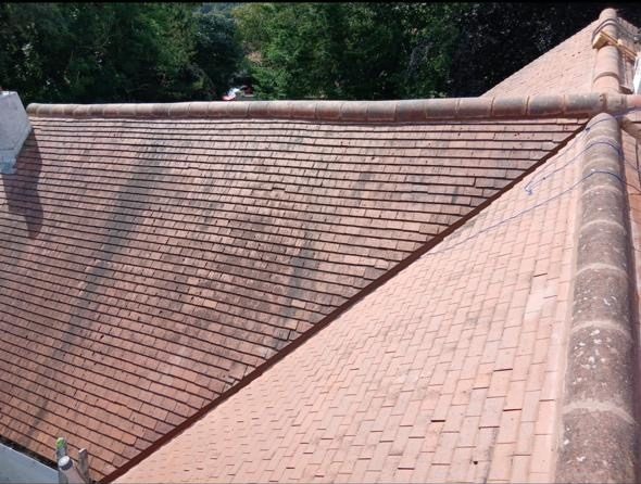 Finished tile roof showing hip and ridge detail