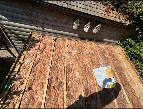 Flat roof insulation and decking build-up