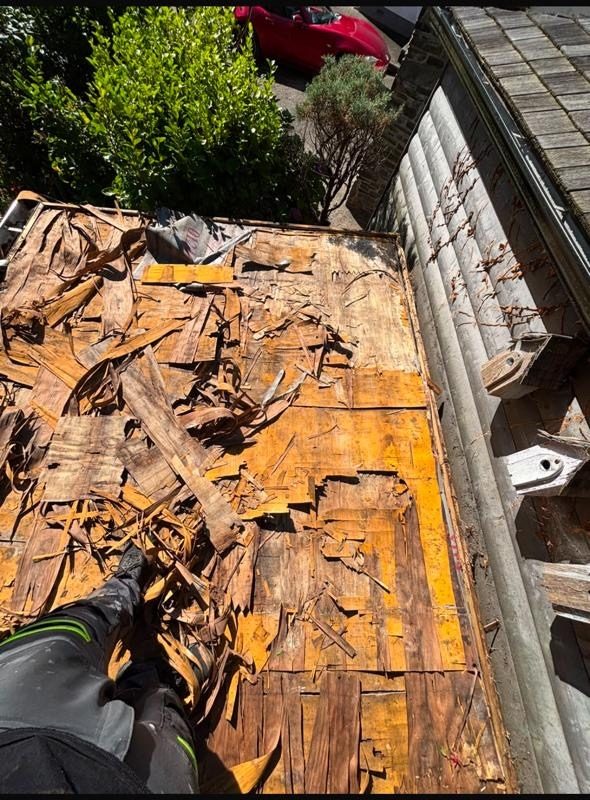 Roof stripped back and ready for a new deck