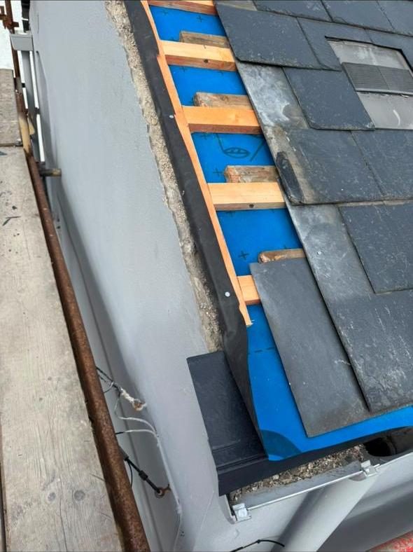 New battens and breather membrane fitted at roof edge