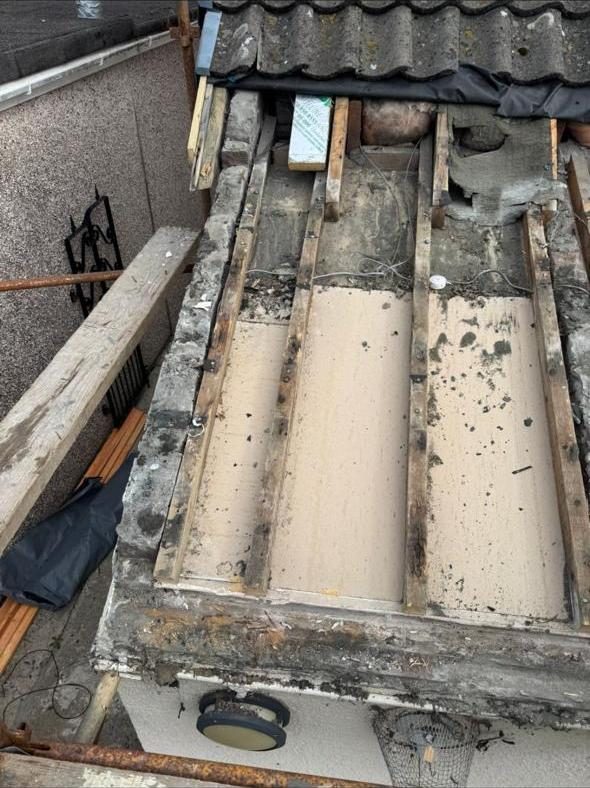 Old flat roof deck stripped back to rotten timber